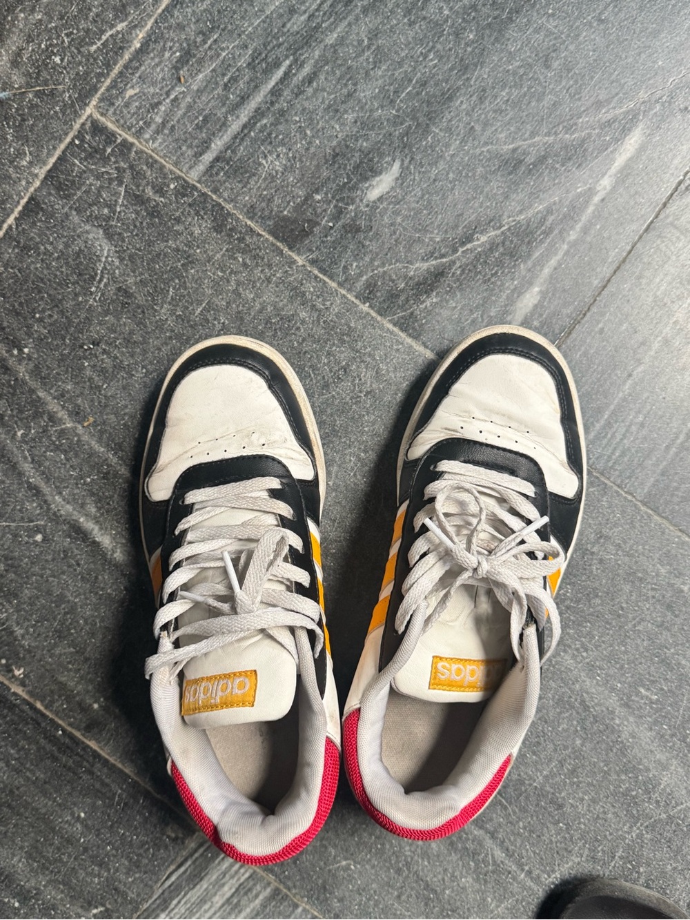 adidas Men’s White & Black Sneakers with Yellow Stripes and Red Heel